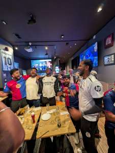 Barcelona fans celebrate with Real Madrid fans after 2025 Copa del Rey soccer match at Lion Sports Bar best soccer bar Philly World Cup 2026 Philadelphia center city sports bar football 2
