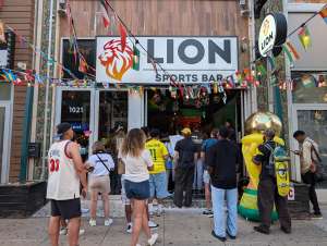 Crowd watches FIFA World Cup Outside Lion Sports Bar Philadelphia Best Soccer Bar Philly Center City Number 1 Soccer Bar