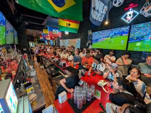 A large crowd of fans watch FIFA World Cup game at Lion Sports Bar Philly best soccer bar philadelphia best soccer bar center city downtown number 1 soccer bar philly